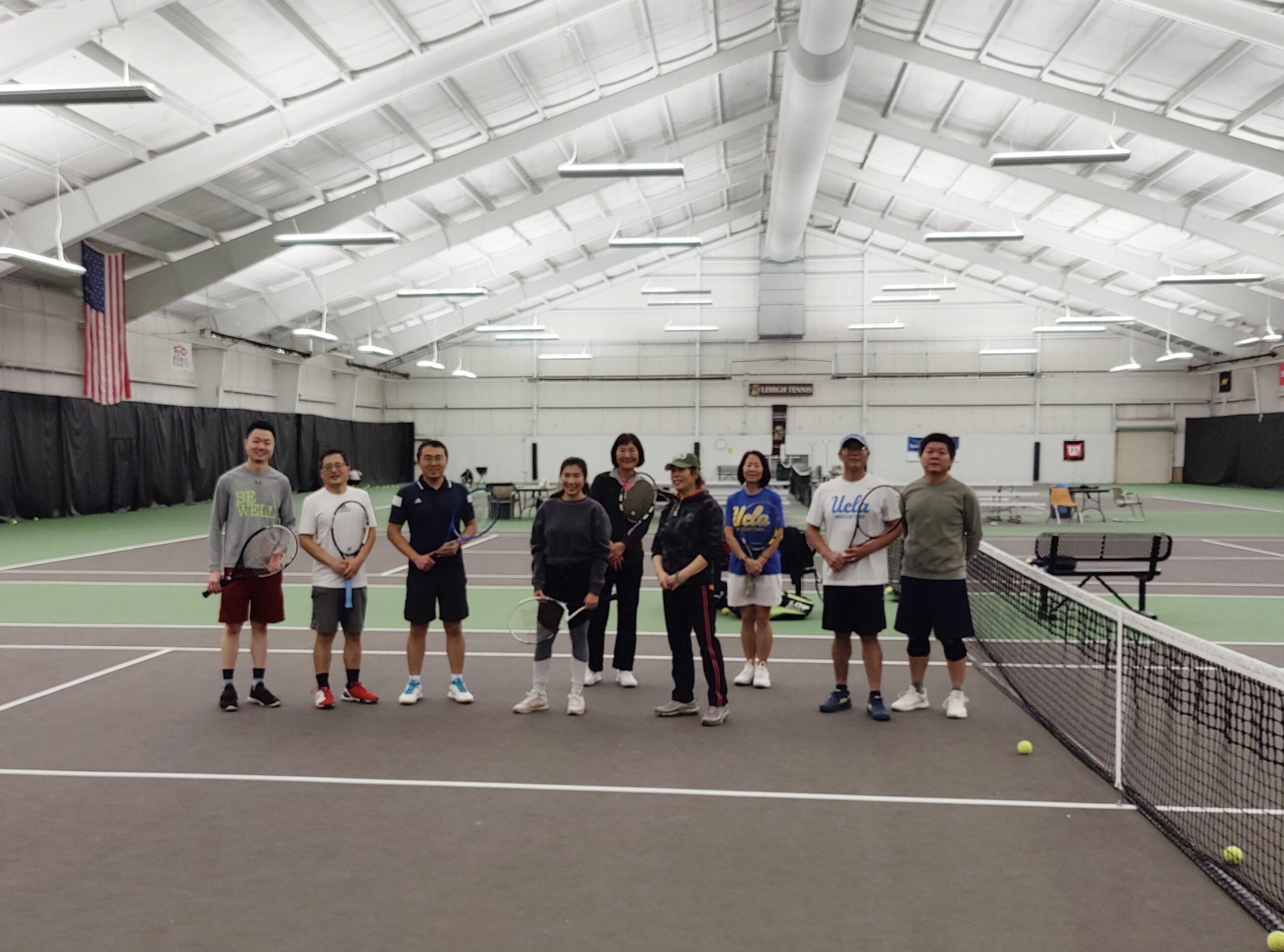 Adult players at a 2025 winter WTN tennis lesson