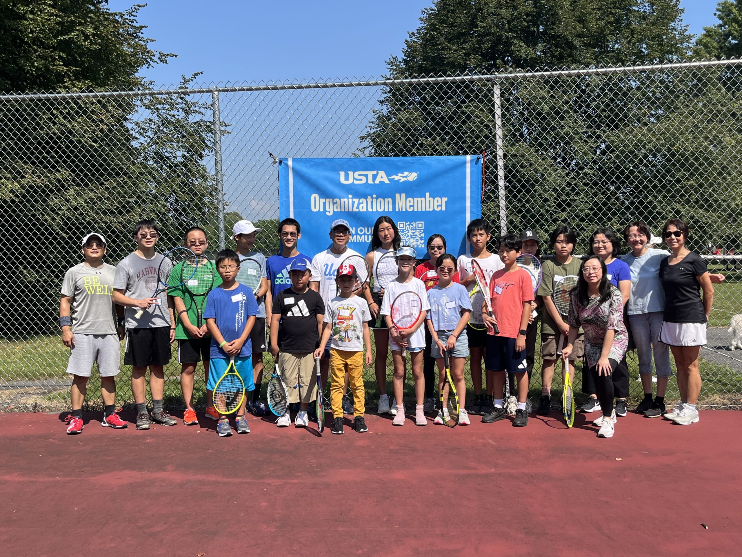 HXCS-LV community tennis players gathered outdoors