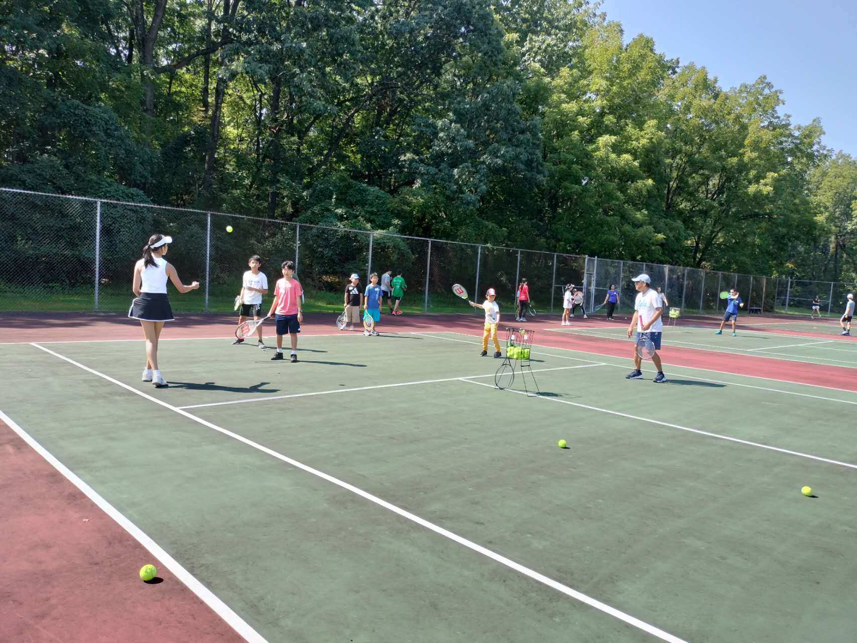Children learning tennis fundamentals