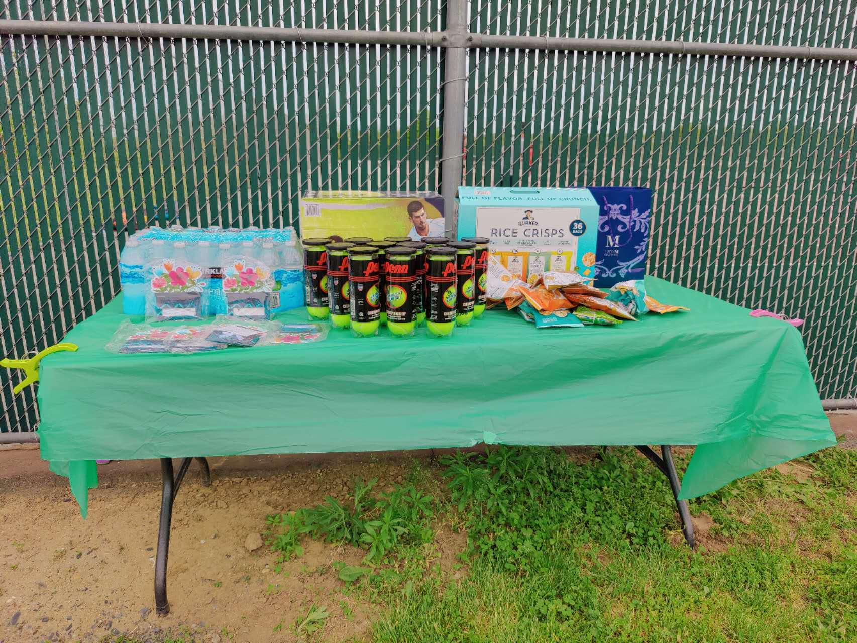 Supplies and tennis balls prepared for the spring ladder closing event