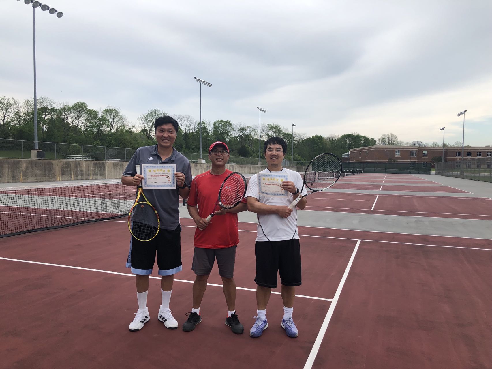 Players celebrating the 2022 spring tournament