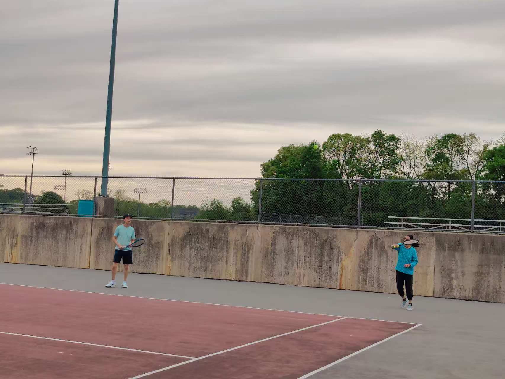 Doubles players competing during the 2023 spring tennis ladder