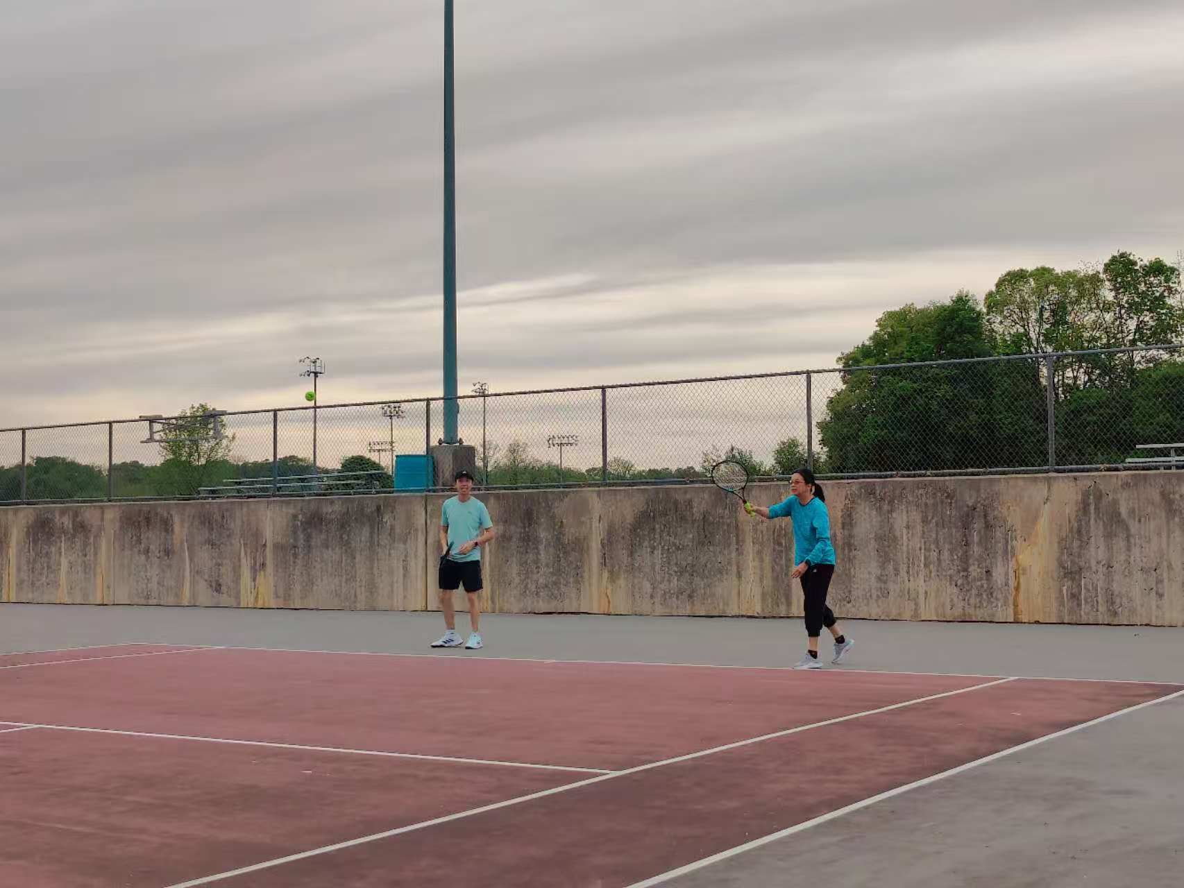 Spring tennis ladder match in progress