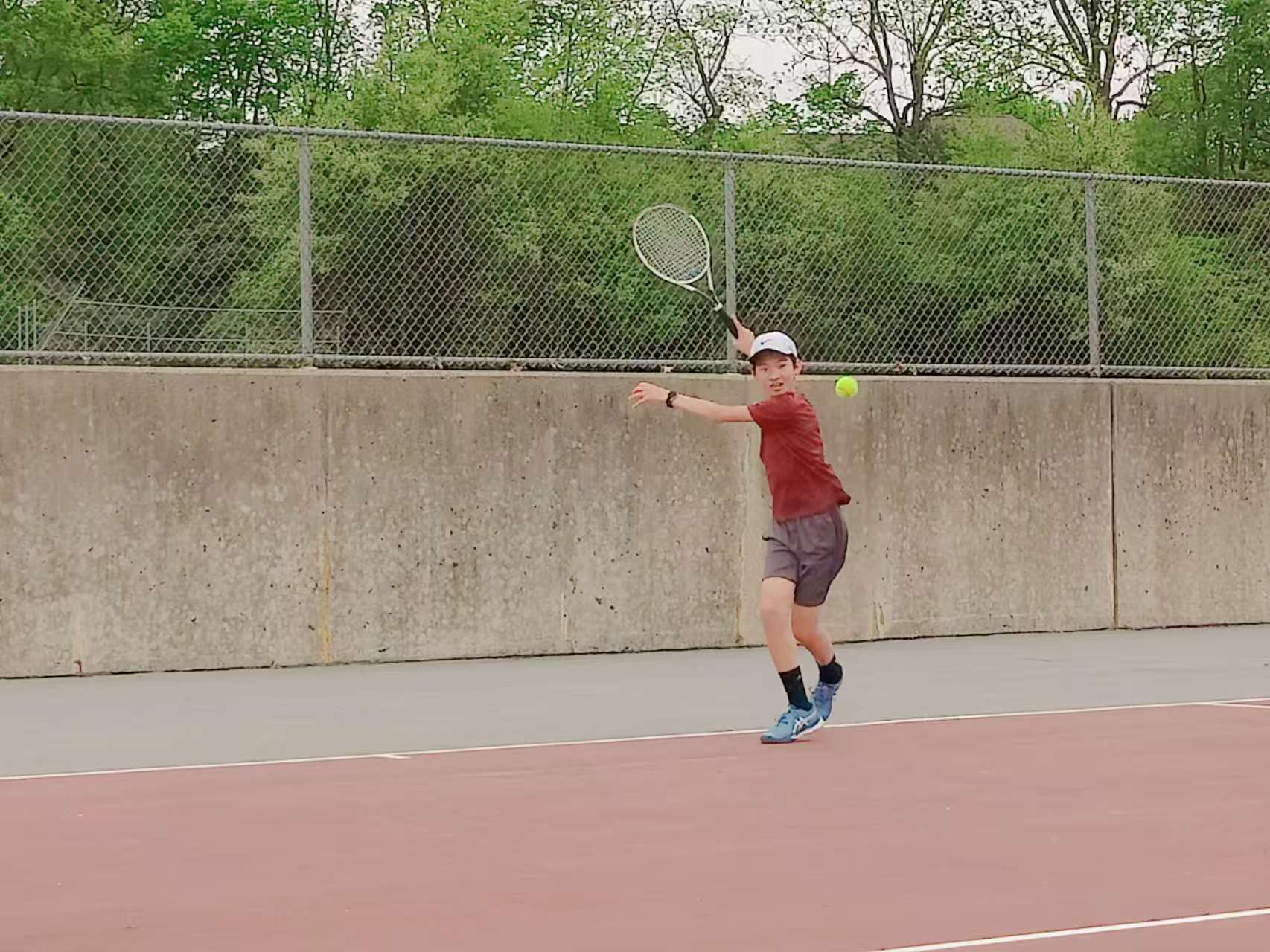 Tennis players participating in the spring ladder