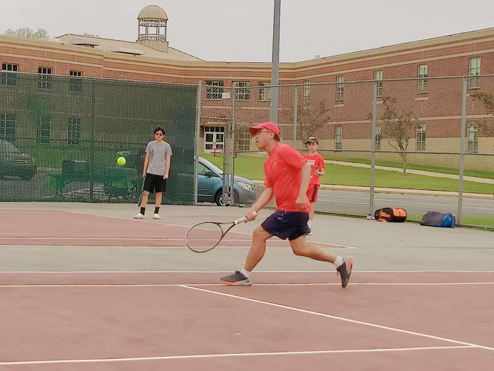 A 2023 spring ladder match on the outdoor courts